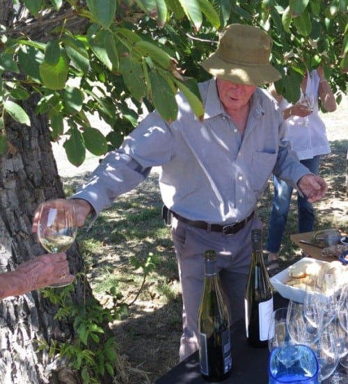 Firmly in the shade - Viv Thomson dispenses Riesling on a most welcome vineyard tour pit stop